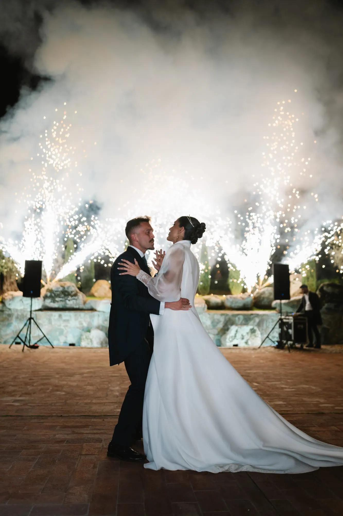 The couple’s first dance with cold sparklers in the background
