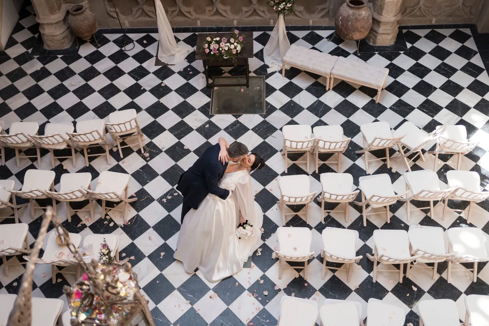 Ceremony set-up seen from above, on a chequerboard floor